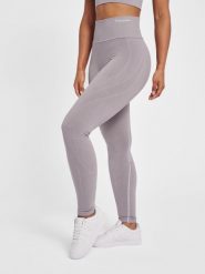 Legginsy damskie Hummel MT Flow. Fioletowe legginsy damskie Hummel, bez wzorów, z dzianiny. Za 229.85 zł.