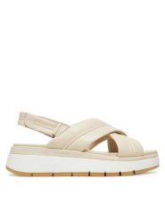 Clarks Sandały Tuscan Cross 26181470 Écru. Sandały damskie Clarks, bez wzorów, ze skóry, bez obcasa, na płaskiej podeszwie, bez zapięcia. Za 449.99 zł.