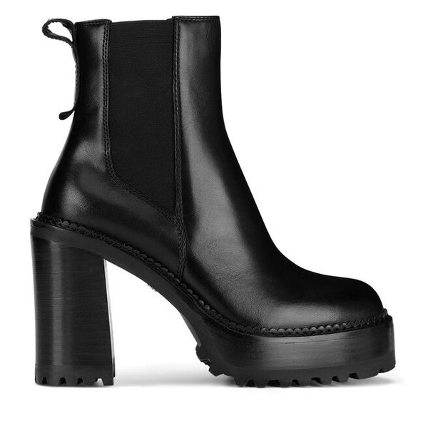 Botki GINO ROSSI. Czarne botki damskie Gino Rossi, bez wzorów, bez obcasa, na słupku, bez zapięcia. Za 329.99 zł.