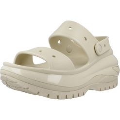 Klapki Crocs Model Classic Mega Crush Sandal Kolor Beżowy. Brązowe klapki damskie Crocs, bez wzorów, z gumy, sportowe, bez obcasa, bez zapięcia. Za 333.30 zł.
