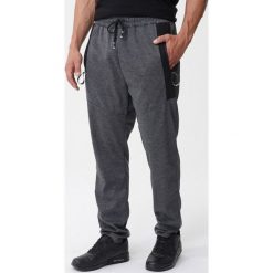 Ciemnoszare Spodnie Barrage. Szare spodnie sportowe męskie Born2be, l, bez wzorów, z dzianiny, climacool (adidas). Za 49.99 zł.