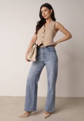 Niebieskie Szerokie Jeansy z Bawełny z Wysokim Stanem Berinielle. Niebieskie jeansy damskie Born2be, bez wzorów, z bawełny, eleganckie, z podwyższonym stanem. Za 99.99 zł.