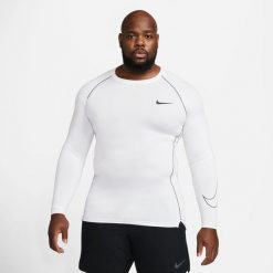 Koszulka Męska Termoaktywna Nike Pro Tight Compression. Białe bluzy męskie Nike, m, bez wzorów, sportowe, bez ramiączek, bez kaptura. W wyprzedaży za 158.35 zł.