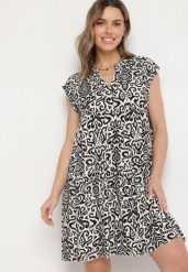 Czarna Bawełniana Sukienka o Rozkloszowanym Kroju Oversize Liravina. Czarne sukienki damskie Born2be, na co dzień, l, bez wzorów, z bawełny, eleganckie, bez kołnierzyka, bez ramiączek, midi, oversize. Za 39.99 zł.