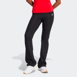 Legginsy fitness damskie ADIDAS flare. Czarne legginsy damskie Adidas, bez wzorów, z bawełny. Za 119.99 zł.