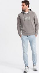 Ombre Męskie spodnie jeansowe JOGGERY z przetarciami - jasnoniebieskie V1 OM-PADJ-0150 XXL. Niebieskie spodnie sportowe męskie Ombre, m, bez wzorów, z jeansu. Za 99.99 zł.