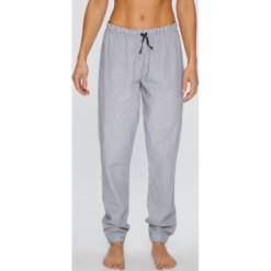 Tommy Hilfiger - Spodnie piżamowe. Niebieskie piżamy damskie Tommy Hilfiger, bez wzorów, z bawełny, bez ramiączek. W wyprzedaży za 149.90 zł.