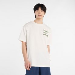 Koszulka męska New Balance MT53921SST – biała. Białe koszulki sportowe męskie New Balance, m, z aplikacjami, z dresówki, bez ramiączek. Za 169.99 zł.