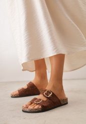 Brązowe Klapki na Podeszwie z Imitacji Korka z Szydełkowymi Paskami z Klamrami Carilorin. Brązowe klapki damskie Born2be, bez wzorów. Za 89.99 zł.