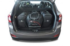 Torby Do Bagażnika Hyundai Ix35 2010-2013 4Szt Kjust. Czarne torby podróżne damskie KJUST, bez wzorów, z kauczuku. Za 1,203.00 zł.