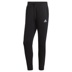 Spodnie adidas Essentials Single Tapered Cuff. Czarne spodnie sportowe męskie Adidas, m, bez wzorów, do biegania. Za 159.00 zł.