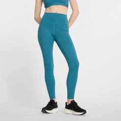 Legginsy damskie New Balance WP41275TEI – niebieskie. Niebieskie legginsy damskie New Balance, bez wzorów, z materiału. Za 169.99 zł.