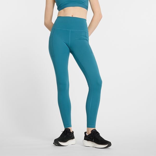 Legginsy damskie New Balance WP41275TEI – niebieskie. Niebieskie legginsy damskie New Balance, bez wzorów, z materiału. Za 169.99 zł.