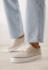 Beżowe Klasyczne Tenisówki z Ozdobnym Paskiem przy Podeszwie Ranora. Brązowe obuwie sportowe damskie Born2be, bez wzorów, z dresówki, bez zapięcia, tenisowe. Za 49.99 zł.