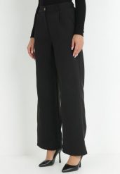 Czarne Spodnie Szerokie High Waist Ivan. Czarne spodnie materiałowe damskie Born2be, bez wzorów, z jeansu, klasyczne, z podwyższonym stanem. Za 84.99 zł.