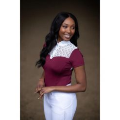 Damska koszulka do jazdy konnej Equestrian Stockholm Champion. Czerwone bluzki damskie EQUESTRIAN STOCKHOLM, bez wzorów, sportowe, bez kołnierzyka, bez ramiączek. Za 408.50 zł.