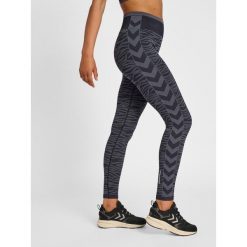 Legginsy damskie Hummel MT Saga. Czarne legginsy damskie Hummel, bez wzorów, z elastanu. Za 179.80 zł.