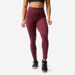 Legginsy fitness damskie Domyos. Fioletowe legginsy damskie DOMYOS, bez wzorów, z elastanu. Za 129.99 zł.