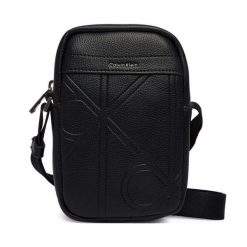 Saszetka Calvin Klein. Czarne saszetki i nerki męskie Calvin Klein, bez wzorów. Za 329.99 zł.