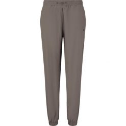 Damskie spodnie dresowe Athlecia Hero. Brązowe spodnie dresowe damskie Athlecia, bez wzorów, z dresówki, sportowe, na fitness i siłownię. Za 179.00 zł.