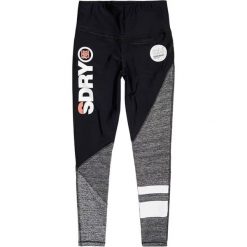Legginsy sportowe damskie Superdry Sport Colour Block. Czarne legginsy damskie Superdry, bez wzorów, z gumy. Za 112.49 zł.