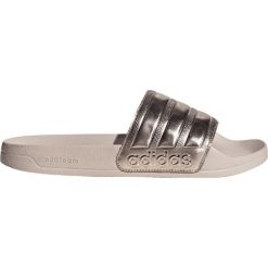 Klapki męskie basenowe Adidas ADILETTE. Żółte klapki męskie Adidas, bez wzorów, z materiału, bez zapięcia. Za 160.00 zł.