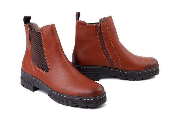 RIEKER 73892-24 brown, botki damskie. Brązowe botki damskie Rieker, bez wzorów, z gumy, bez obcasa, bez zapięcia. Za 369.90 zł.