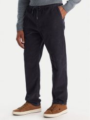 Quiksilver Spodnie materiałowe Taxer EQYNP03315 Granatowy Loose Fit. Niebieskie spodnie materiałowe męskie Quiksilver, bez wzorów, z bawełny. Za 349.99 zł.