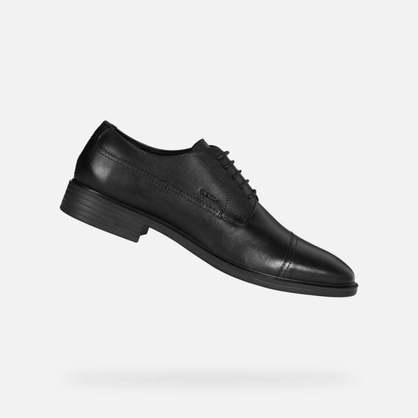 Sandały Geox Gladwin. Czarne sandały męskie Geox, na lato, bez wzorów, z materiału, eleganckie, bez zapięcia. Za 430.50 zł.