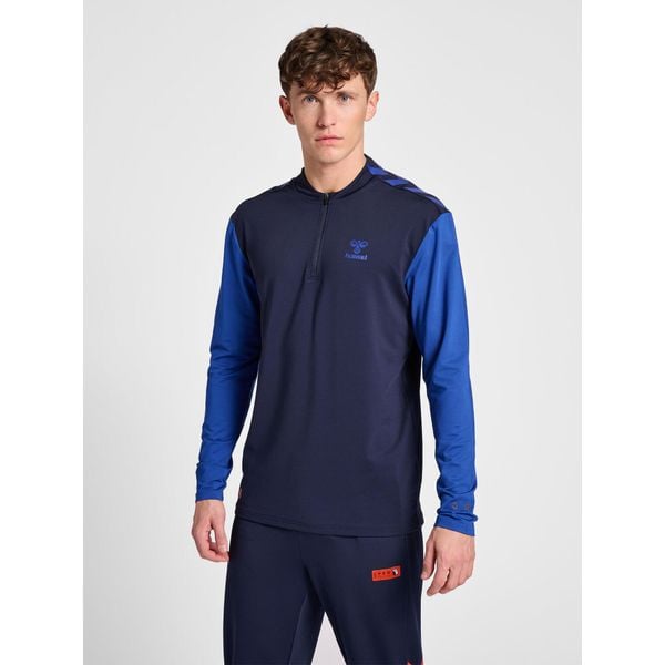 Bluza dresowa 1/2 zip Hummel Pro Grid. Niebieskie bluzy męskie Hummel, bez wzorów, z dresówki, sportowe, bez ramiączek, bez kaptura. W wyprzedaży za 242.00 zł.