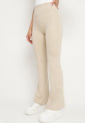 Jasnobeżowe Legginsy Typu Dzwony z Wysokim Stanem Orralise. Brązowe legginsy damskie Born2be, bez wzorów, z jeansu. Za 44.99 zł.