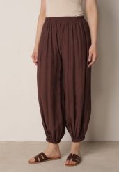 Brązowe Baloniaste Spodnie z Wysokim Stanem w Stylu Casual Lilanya. Brązowe spodnie materiałowe damskie Born2be, na lato, bez wzorów, z jeansu, biznesowe, z podwyższonym stanem, krótkie. Za 89.99 zł.