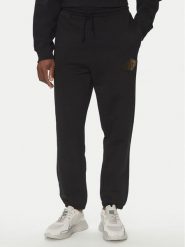 HUGO Spodnie dresowe Dacusi 50534952 Czarny Relaxed Fit. Czarne spodnie sportowe męskie Hugo, m, bez wzorów, z bawełny. Za 249.99 zł.