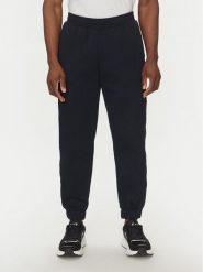 EA7 Emporio Armani Spodnie dresowe 7M000545 AF12660 UB102 Granatowy Modern Fit. Niebieskie spodnie sportowe męskie EA7 Emporio Armani, m, bez wzorów, z dresówki. Za 279.99 zł.
