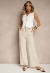 Beżowe Szerokie Spodnie High Waist z Gumką w Pasie Savimirae. Brązowe spodnie materiałowe damskie Renee, bez wzorów, z jeansu, eleganckie, z podwyższonym stanem. Za 39.99 zł.
