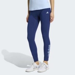 Legginsy fitness damskie ADIDAS. Niebieskie legginsy damskie Adidas, bez wzorów, z materiału. Za 129.99 zł.