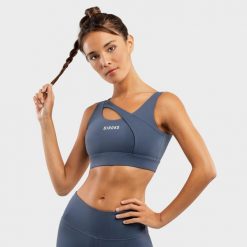 Stanik sportowy fitness damski - Wysokie wsparcie Cross Blue. Niebieskie bielizna sportowa damska SIROKO, xs, bez wzorów, z nylonu. Za 105.00 zł.