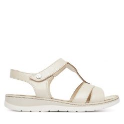 Sandały Caprice. Białe sandały damskie Caprice, bez wzorów, bez obcasa, na płaskiej podeszwie, bez zapięcia. Za 269.99 zł.