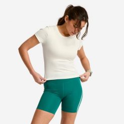 Koszulka fitness damska Domyos prążkowana. Białe bluzki damskie DOMYOS, xs, bez wzorów, z elastanu, sportowe, bez kołnierzyka, bez ramiączek. Za 69.99 zł.