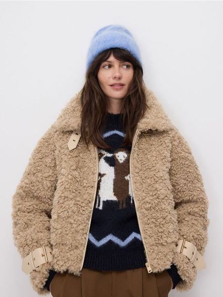 Czapka z wełną alpaki - jasnoniebieski. Niebieskie czapki damskie Reserved, bez wzorów, z wełny. Za 99.99 zł.