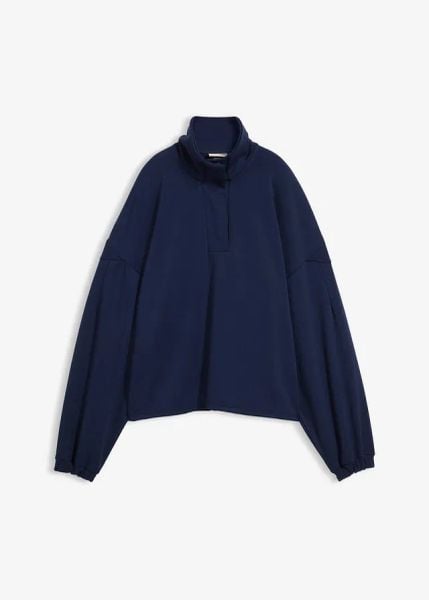 Bluza oversize z dzianiny typu scuba. Niebieskie bluzy damskie bonprix, bez wzorów, z dzianiny, bez ramiączek, bez kaptura. Za 59.99 zł.