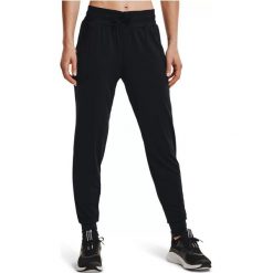 Spodnie treningowe damskie Under Armour New Fabric Hg Armour. Czarne spodnie dresowe damskie Under Armour, bez wzorów, sportowe. Za 182.99 zł.
