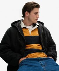 Superdry Kurtka z kapturem Canvas Surplus z bawełny z pikowaną podszewką. Czarne kurtki męskie Superdry, m, z aplikacjami, z bawełny, klasyczne, z kapturem. Za 381.50 zł.