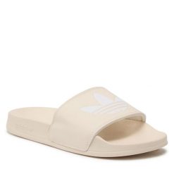 Klapki adidas. Brązowe klapki damskie Adidas, bez wzorów, sportowe, bez obcasa, bez zapięcia. Za 119.99 zł.