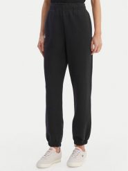 Lacoste Spodnie dresowe XF5244 Granatowy Regular Fit. Niebieskie spodnie dresowe damskie Lacoste, bez wzorów, z bawełny. Za 639.99 zł.