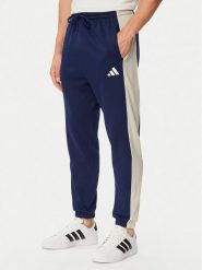 Adidas Spodnie dresowe Seasonal Essentials Colorblock Fleece KF4211 Niebieski Cosy Fleece Fit. Niebieskie spodnie sportowe męskie Adidas, m, bez wzorów, z dresówki. Za 239.99 zł.