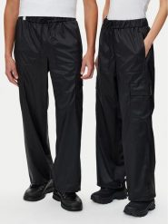 Rains Spodnie przeciwdeszczowe Unisex 18990 Czarny Wide Leg. Czarne spodnie sportowe damskie Rains, bez wzorów, z syntetyku, sportowe, żeglarskie. Za 269.99 zł.