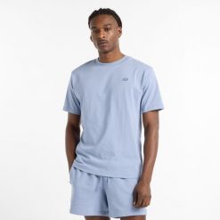 Koszulka męska New Balance MT41533DUS – niebieska. Niebieskie koszulki sportowe męskie New Balance, m, bez wzorów, z dresówki, bez ramiączek. Za 119.99 zł.