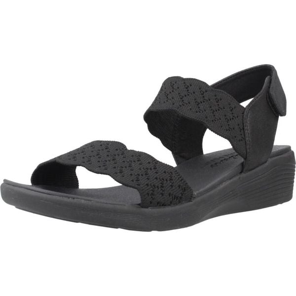 Sandały SKECHERS ARYA Czarny. Czarne sandały damskie Skechers, bez wzorów, z materiału, bez obcasa, bez zapięcia. Za 390.00 zł.