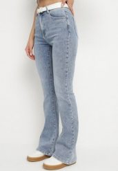 Niebieskie Jeansy o Kroju Dzwonów z Regularnym Stanem Nelirelia. Niebieskie jeansy damskie Born2be, bez wzorów, z jeansu. Za 119.99 zł.